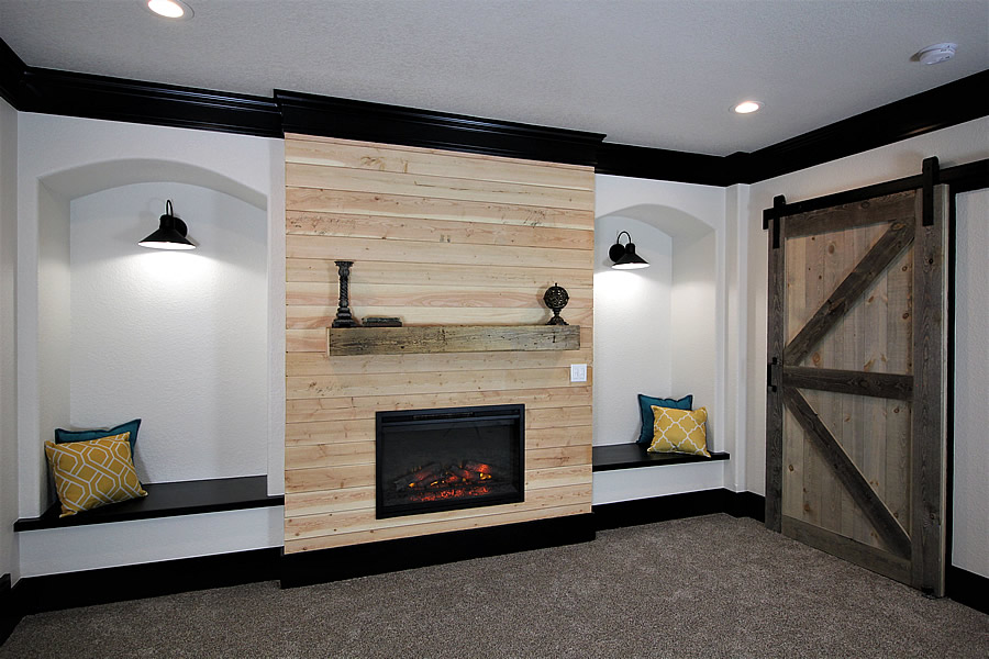 Fireplace insert with wood mantle and built in seating